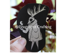 Load image into Gallery viewer, A branch sticker on a black background being held by Fragment Crafting.
